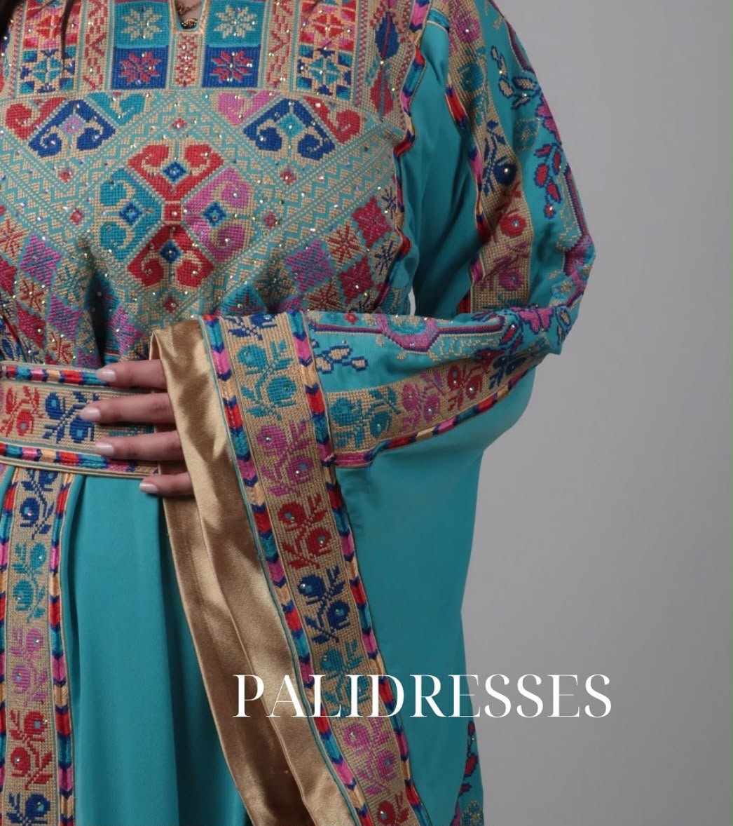 Turquoise thobe detail mouw